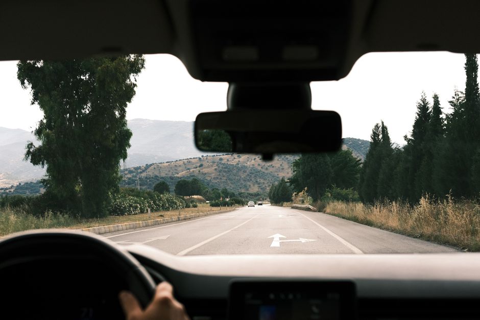 View from inside a car looking through a perfectly clear, newly replaced windshield